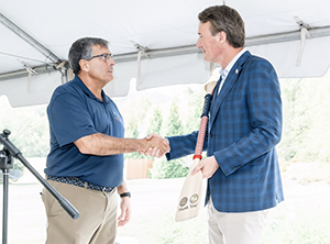 Governor Youngkin is presented a gift by Boulder Crest Foundation founder Ken Falke