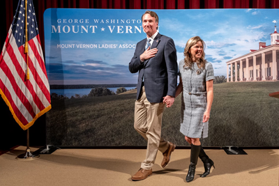 Governor and First Lady walking on stage